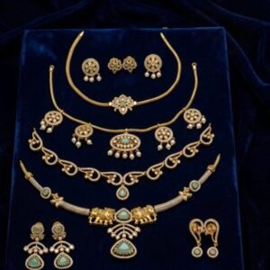 Luxury Matte Gold & Cubic Zirconia Emerald Green Bridal Jewellery Collection Set (Chokers, Necklaces, Elephant Pendant & Matching Earrings)