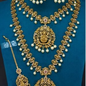 Divine Antique Gold Matte Temple Jewellery Bridal Set with Goddess Lakshmi Medallions & Pearl Clusters (Short Necklace, Haram, Jhumkas & Maang Tikka)